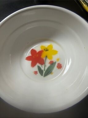 White Ceramic Bowl with Red and Yellow Floral Motif